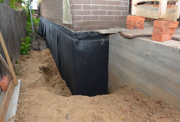 Happy homeowners after waterproofing job in Dunn Loring